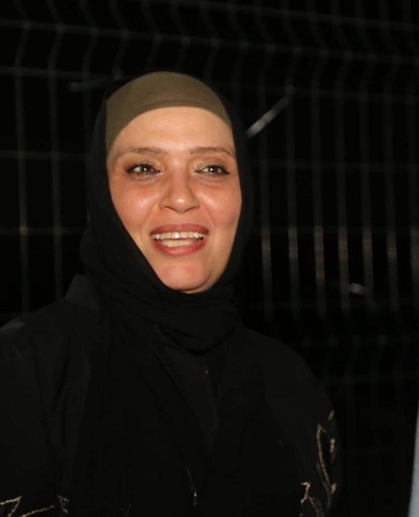 د.عائشة محمد المسلاتي إحدى خريجات كلية الفنون والإعلام قرجي